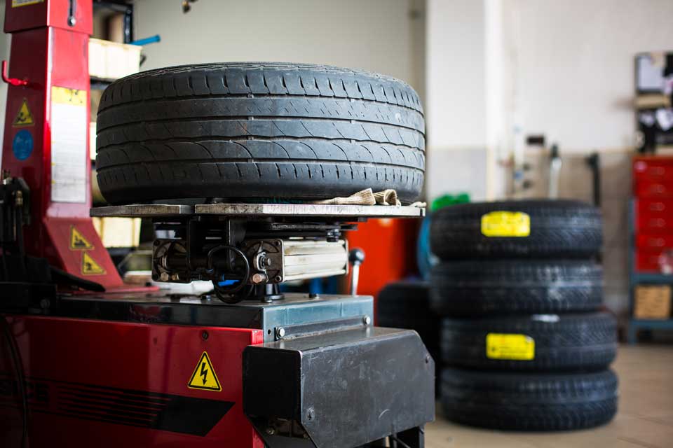 inside a garage changing wheelstires